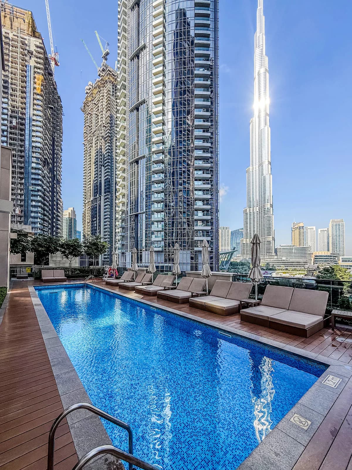 Residents’ pool deck at Act One / Act Two with Downtown Dubai towers behind