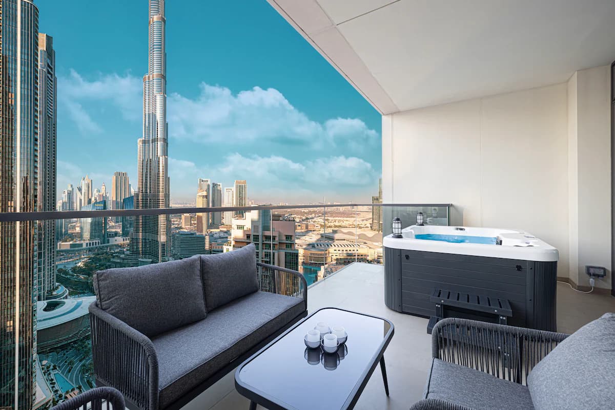 Terrace with jacuzzi and Burj Khalifa view at our 3-bedroom apartment in Act One / Act Two